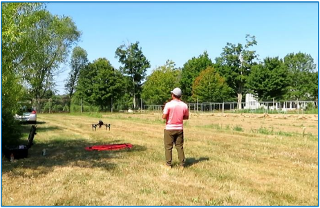 Bivek Bhusal landing Mavic drone after flight over green bean plots infested with potato leafhoppers. Photo: Ana Legrand