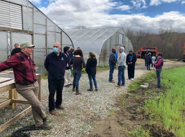UConn FRTEP team members were joined by the tribal leaders and members at a MPTN meechoook farm visit in spring 2021 in Mashantucket, CT. The farm grows tomatoes and lettuce in the high tunnels and pumpkins, squash, sweet corn, beans, strawberries, and raspberries in the field.(Photo: Shuresh Ghimire)