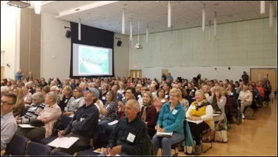 Participants hear a presentation about Monarch butterflies (bottom). Photo: Alyssa Siegel-Miles